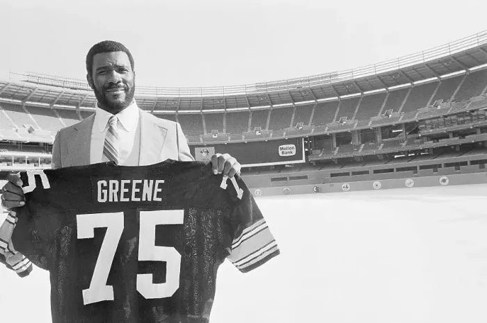 Framed Print : Joe Greene Displaying His Jersey Framed Print : Joe Greene Displaying His Jersey
