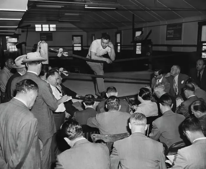 Framed Print : Joe Louis. Heavyweight boxing champion Joe Louis holding a press conference Framed Print : Joe Louis. Heavyweight boxing champion Joe Louis holding a press conference