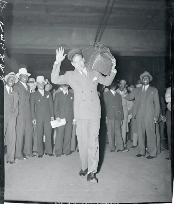 Framed Print : Joe Louis Carrying His Luggage Framed Print : Joe Louis Carrying His Luggage