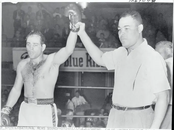Framed Print : Joe Louis Holding Up Carl Olson's Arm Framed Print : Joe Louis Holding Up Carl Olson's Arm