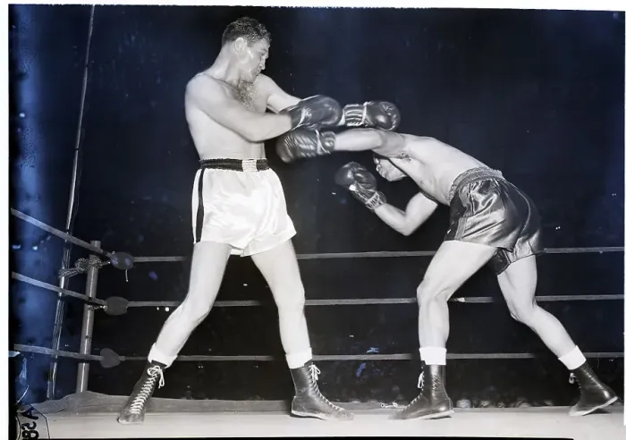 Framed Print : Joe Louis Launches Left at Opponent Framed Print : Joe Louis Launches Left at Opponent