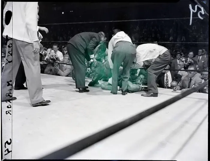 Framed Print : Joe Louis Down on Mat with Referee and Trainers