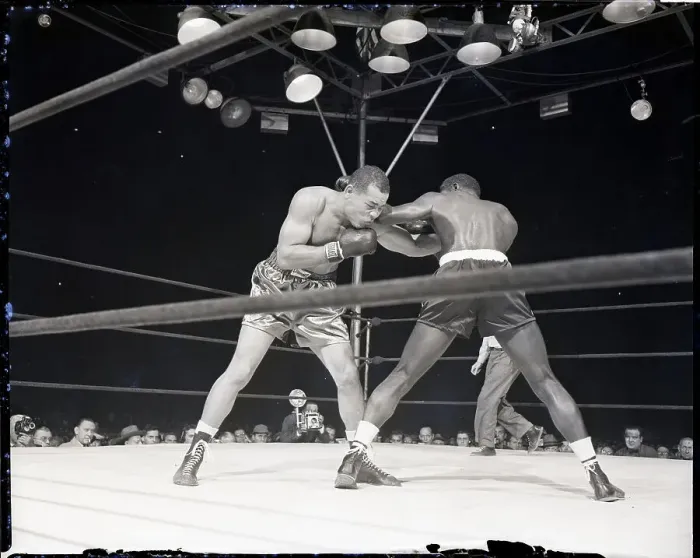 Framed Print : Joe Louis Punching Ezzard Charles Framed Print : Joe Louis Punching Ezzard Charles