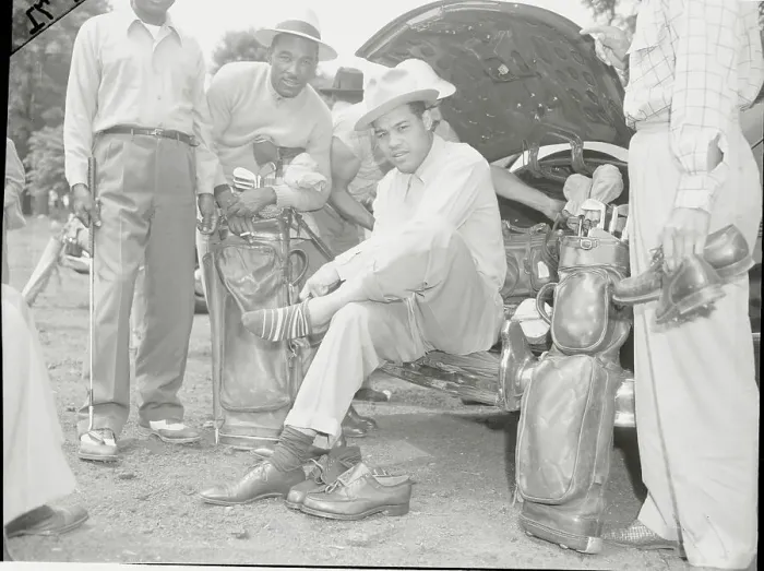 Framed Print : Joe Louis Putting on Golf Socks Framed Print : Joe Louis Putting on Golf Socks
