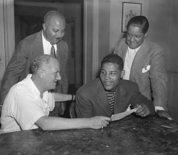 Framed Print : Joe Louis Receiving Check Framed Print : Joe Louis Receiving Check