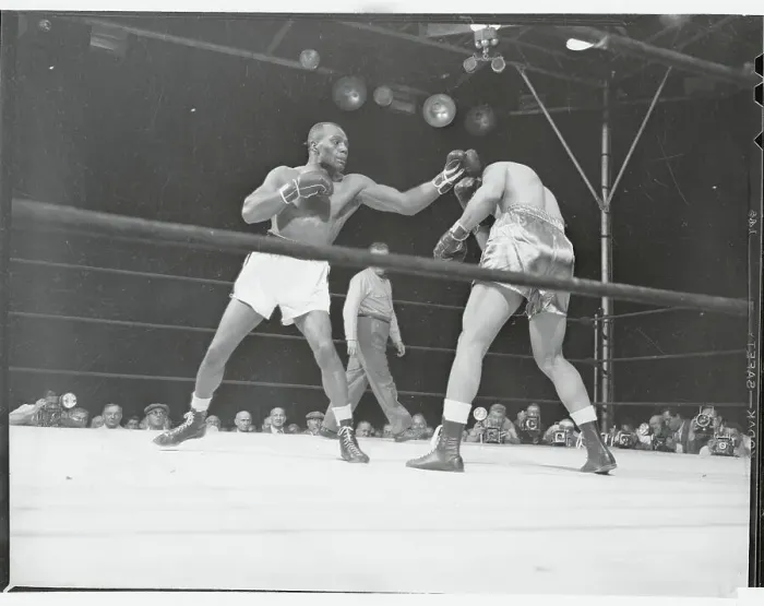 Framed Print : Joe Louis Receiving Head Punch Framed Print : Joe Louis Receiving Head Punch