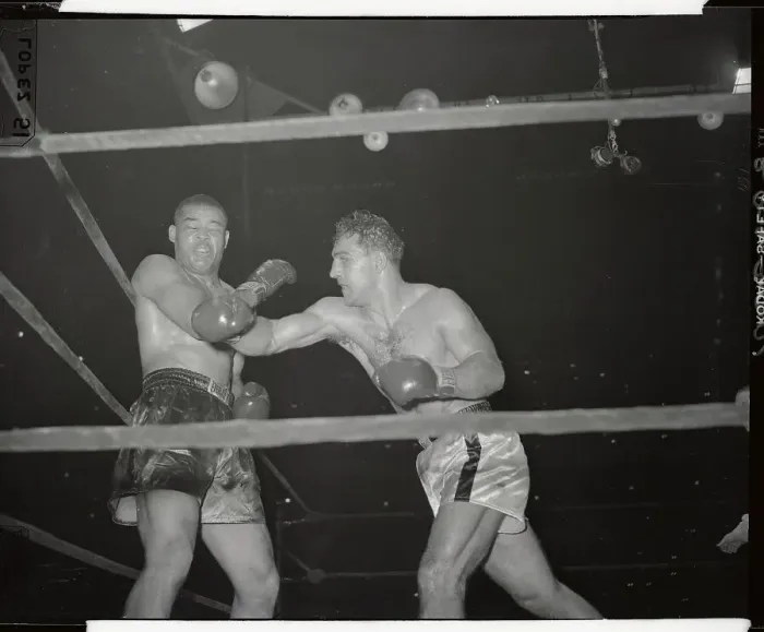Framed Print : Joe Louis Reeling from a Punch by Rocky Marciano Framed Print : Joe Louis Reeling from a Punch by Rocky Marciano