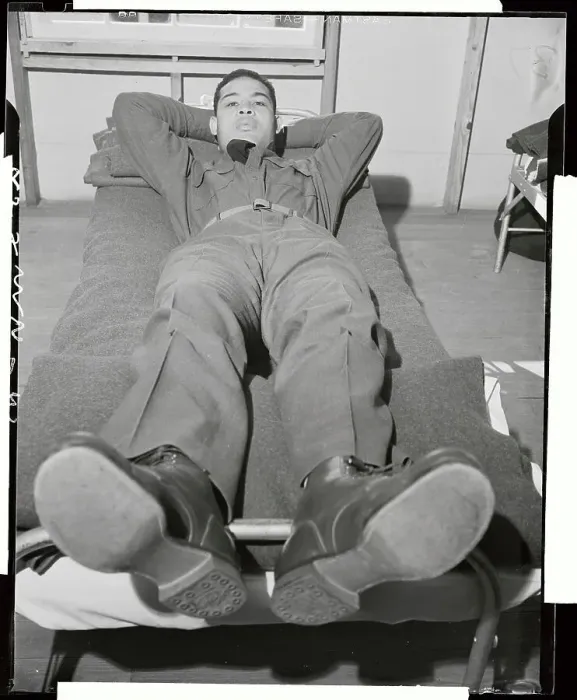 Framed Print : Joe Louis Resting on His Army Cot Framed Print : Joe Louis Resting on His Army Cot