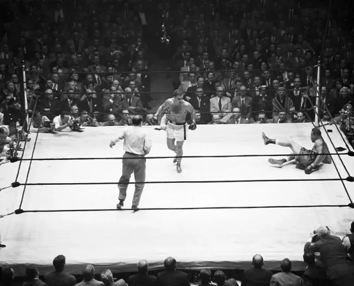 Framed Print : Joe Louis Down in Ring with Rocky Marciano