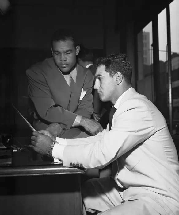 Framed Print : Joe Louis and Rocky Marciano Reading Papers Framed Print : Joe Louis and Rocky Marciano Reading Papers