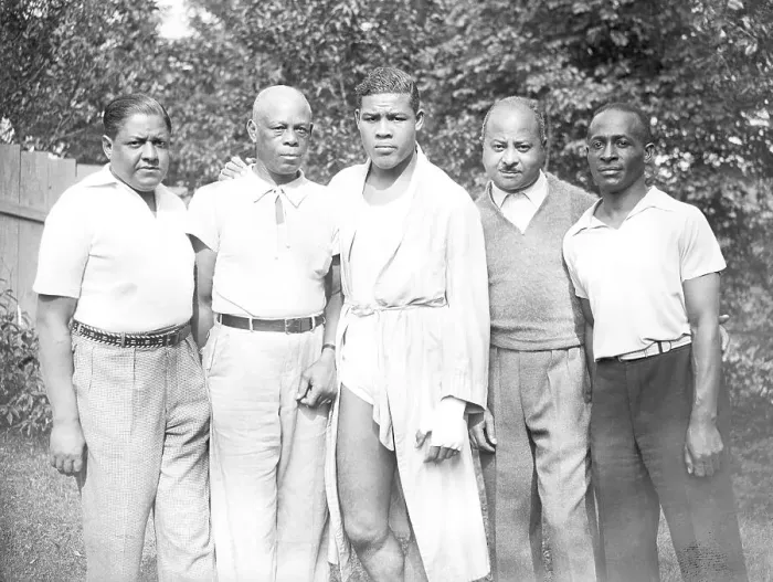 Framed Print : Joe Louis Shown With His Four Trainers Framed Print : Joe Louis Shown With His Four Trainers