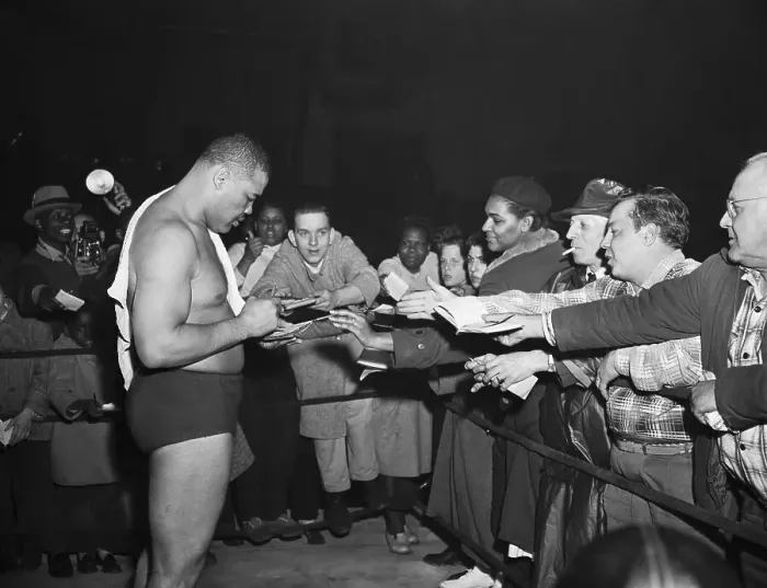 Framed Print : Joe Louis Signing Autographs Framed Print : Joe Louis Signing Autographs