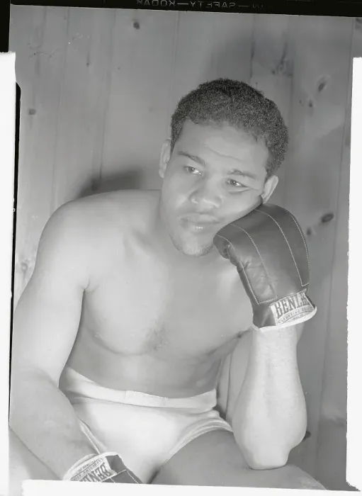 Framed Print : Joe Louis Sitting with Gloved Hand on Cheek Framed Print : Joe Louis Sitting with Gloved Hand on Cheek