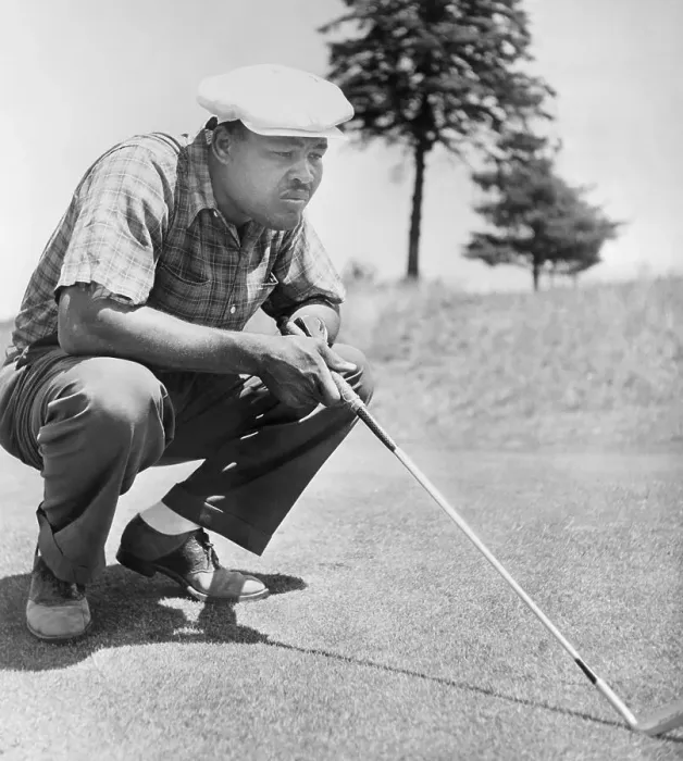Framed Print : Joe Louis Stooping to Examine Golf Strategy Framed Print : Joe Louis Stooping to Examine Golf Strategy