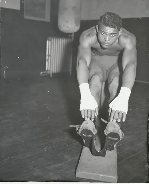 Framed Print : Joe Louis Stretching His Muscles Framed Print : Joe Louis Stretching His Muscles