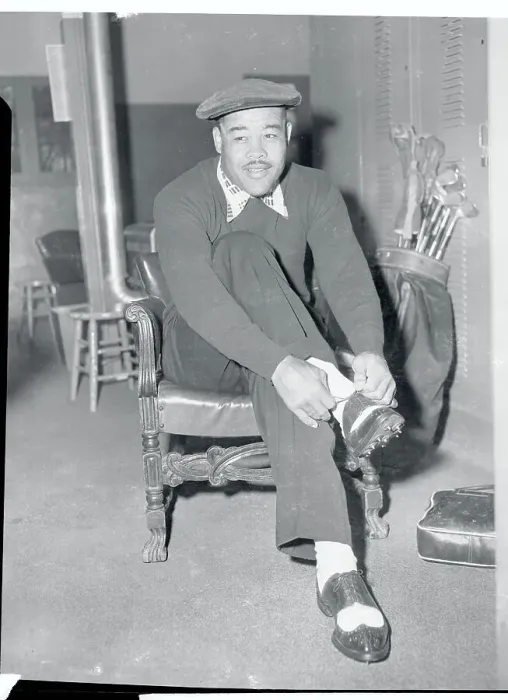 Framed Print : Joe Louis Tying His Shoes