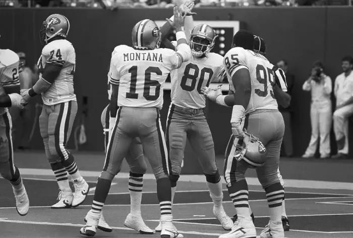 Framed Print : Joe Montana High-Fiving Jerry Rice Framed Print : Joe Montana High-Fiving Jerry Rice