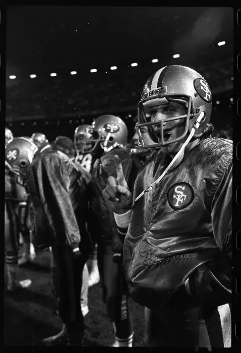 Framed Print : Joe Montana Holds up Number One Sign Framed Print : Joe Montana Holds up Number One Sign