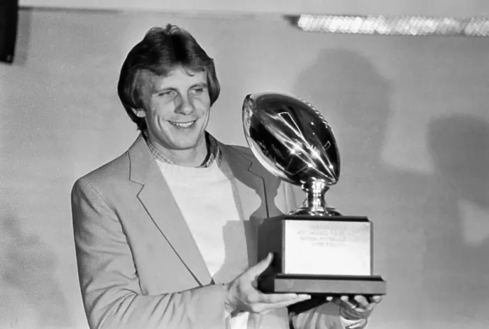 Framed Print : Joe Montana Holds Most Valuable Player Trophy Framed Print : Joe Montana Holds Most Valuable Player Trophy