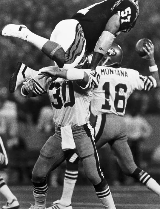 Framed Print : Joe Montana Protected by Teammate as He Makes Pass Framed Print : Joe Montana Protected by Teammate as He Makes Pass