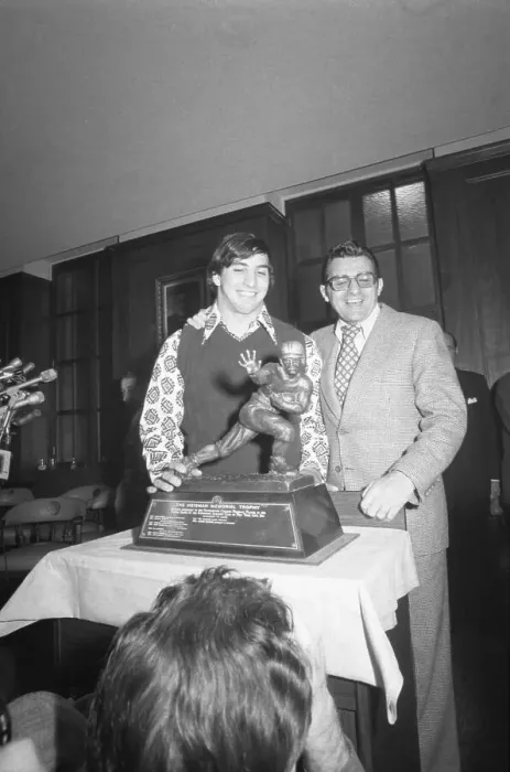 Framed Print : Joe Paterno Looks at Heisman Trophy Framed Print : Joe Paterno Looks at Heisman Trophy