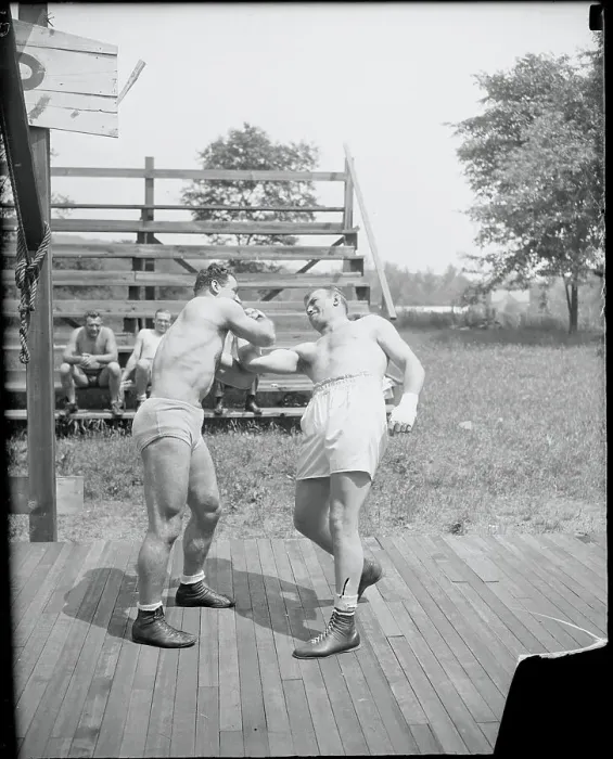 Framed Print : Joe Savoldi Teaching Technique to Jack Sharkey Framed Print : Joe Savoldi Teaching Technique to Jack Sharkey