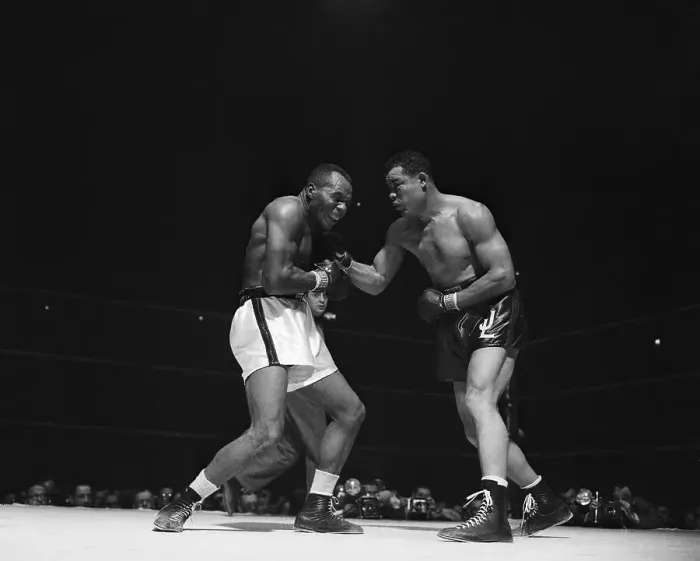 Framed Print : Joe Walcott Grimaces From Joe Louis Punc Framed Print : Joe Walcott Grimaces From Joe Louis Punc