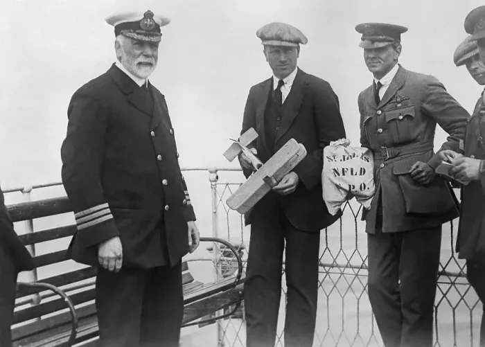 Framed Print : John Alcock Holding Model Airplane with Officers Nearby Framed Print : John Alcock Holding Model Airplane with Officers Nearby