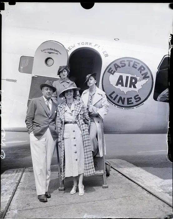 Framed Print : John Barrymore Steppig Off Plane with Party
