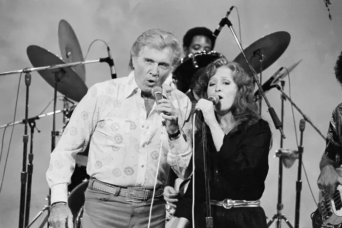 Framed Print : John and Bonnie Raitt Singing with Microphones Framed Print : John and Bonnie Raitt Singing with Microphones