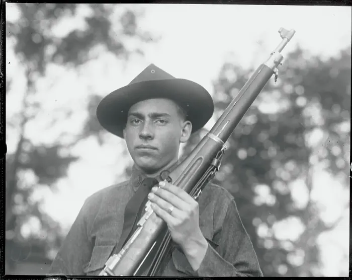 Framed Print : John Coolidge Holding Rifle Framed Print : John Coolidge Holding Rifle