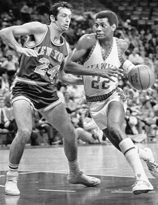 Framed Print : John Drew (22) drives to the basket against Knicks Bill Bradley 