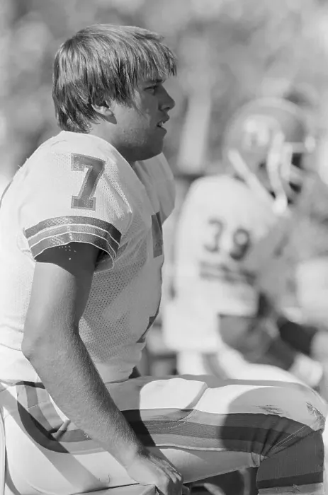 Framed Print : John Elway Sitting on Sidelines in Uniform Framed Print : John Elway Sitting on Sidelines in Uniform