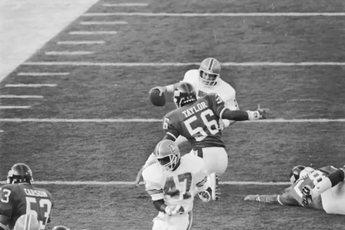 Framed Print : John Elway Being Tackled by Lawrence Taylor Framed Print : John Elway Being Tackled by Lawrence Taylor