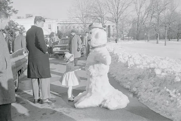 Framed Print : John F Kennedy and Daughter Caroline Admiring Snowman Framed Print : John F Kennedy and Daughter Caroline Admiring Snowman