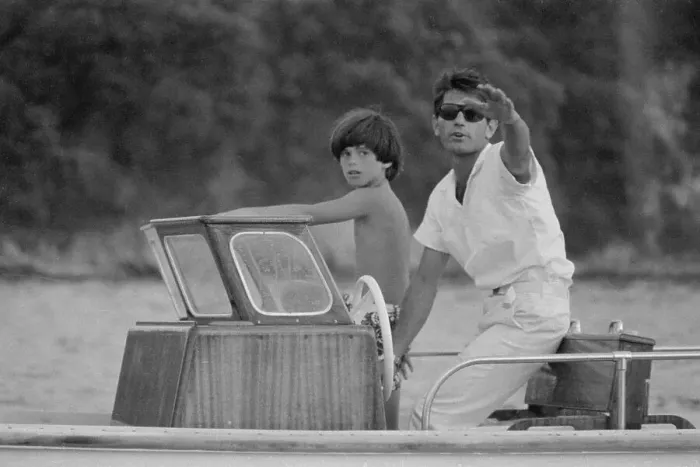 Framed Print : John F Kennedy Jr in Boat with Onassis Bodyguard Framed Print : John F Kennedy Jr in Boat with Onassis Bodyguard