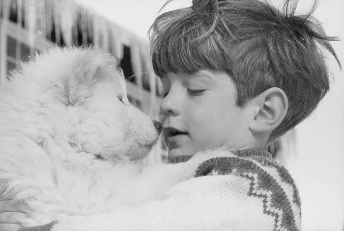 Framed Print : John F. Kennedy Jr. Holding Puppy Framed Print : John F. Kennedy Jr. Holding Puppy