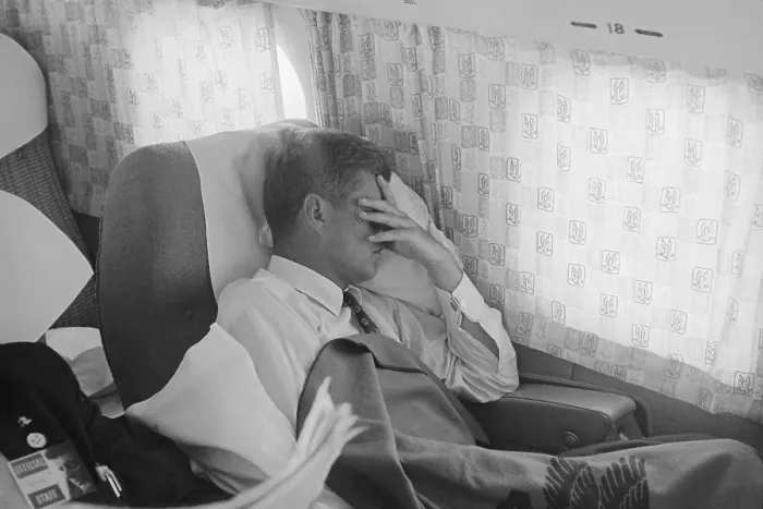 Framed Print : John F. Kennedy Resting in Passenger Cabin of Airplane Framed Print : John F. Kennedy Resting in Passenger Cabin of Airplane