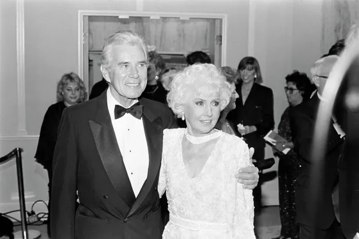 Framed Print : John Forsythe and Barbara Stanwyck