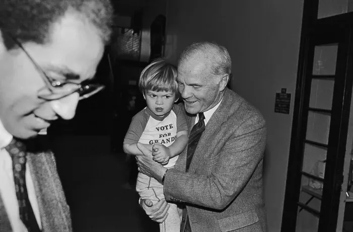 Framed Print : John Glenn Holding His Grandson Framed Print : John Glenn Holding His Grandson
