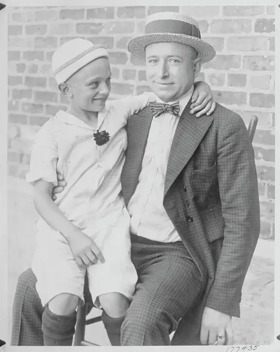 Framed Print : John Gorecki Holding His Young Son Framed Print : John Gorecki Holding His Young Son