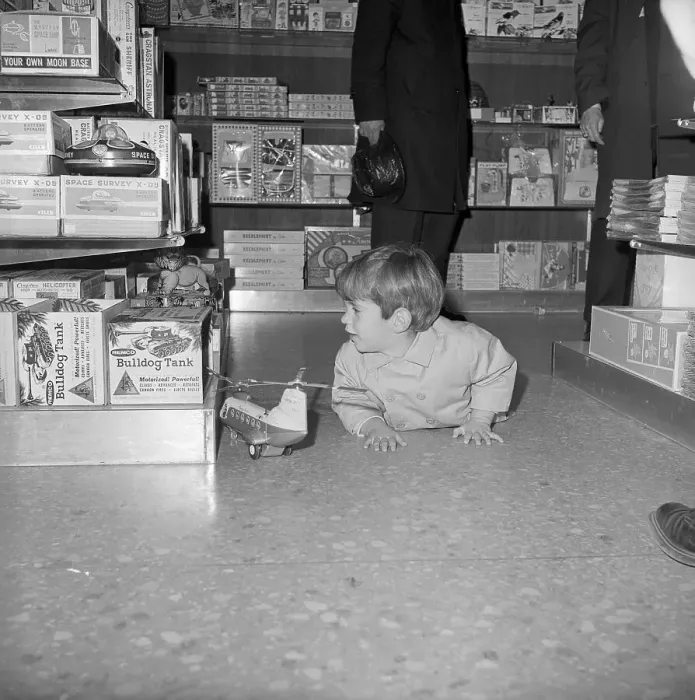 Framed Print : John Kennedy Jr. Playing with a Helicopter Framed Print : John Kennedy Jr. Playing with a Helicopter