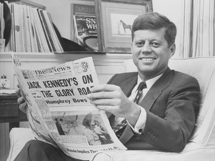 Framed Print : John Kennedy Reading the Newspaper Framed Print : John Kennedy Reading the Newspaper