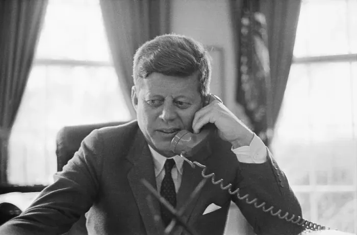 Framed Print : John Kennedy Using Telephone