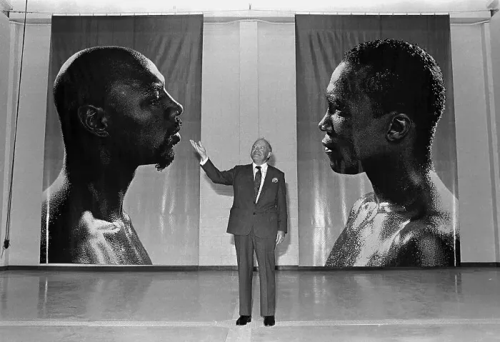 Framed Print : John Kluge Standing Before Portraits
