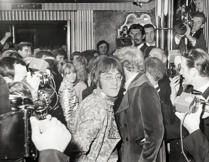 Framed Print : John Lennon Arriving at Theater with Wife Framed Print : John Lennon Arriving at Theater with Wife