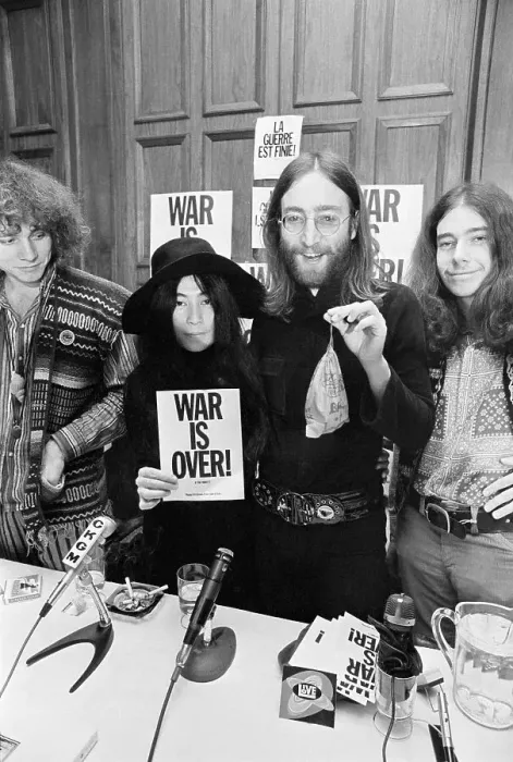 Framed Print : John Lennon and Yoko Ono with War Is Over Sign Framed Print : John Lennon and Yoko Ono with War Is Over Sign