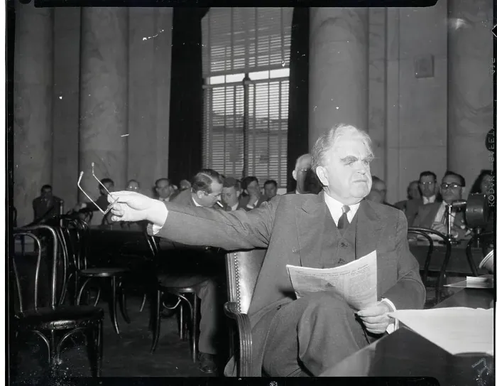 Framed Print : John Lewis Seated with Newspaper