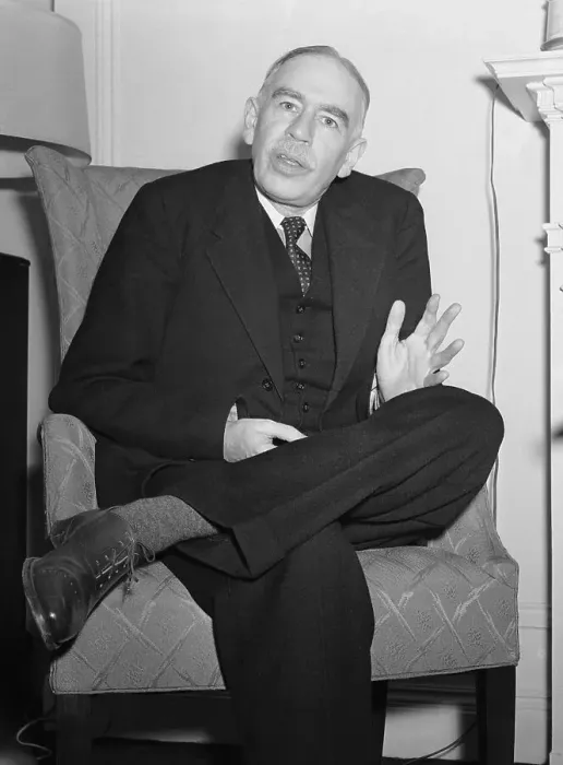 Framed Print : John Maynard Keynes Sitting in Armchair Framed Print : John Maynard Keynes Sitting in Armchair