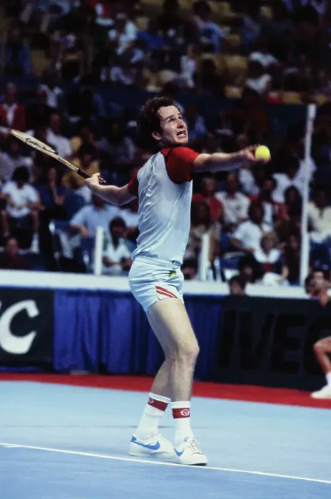 Framed Print : John McEnroe Serving Ball